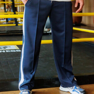 Wijde joggingbroek met banden langs de pijpen